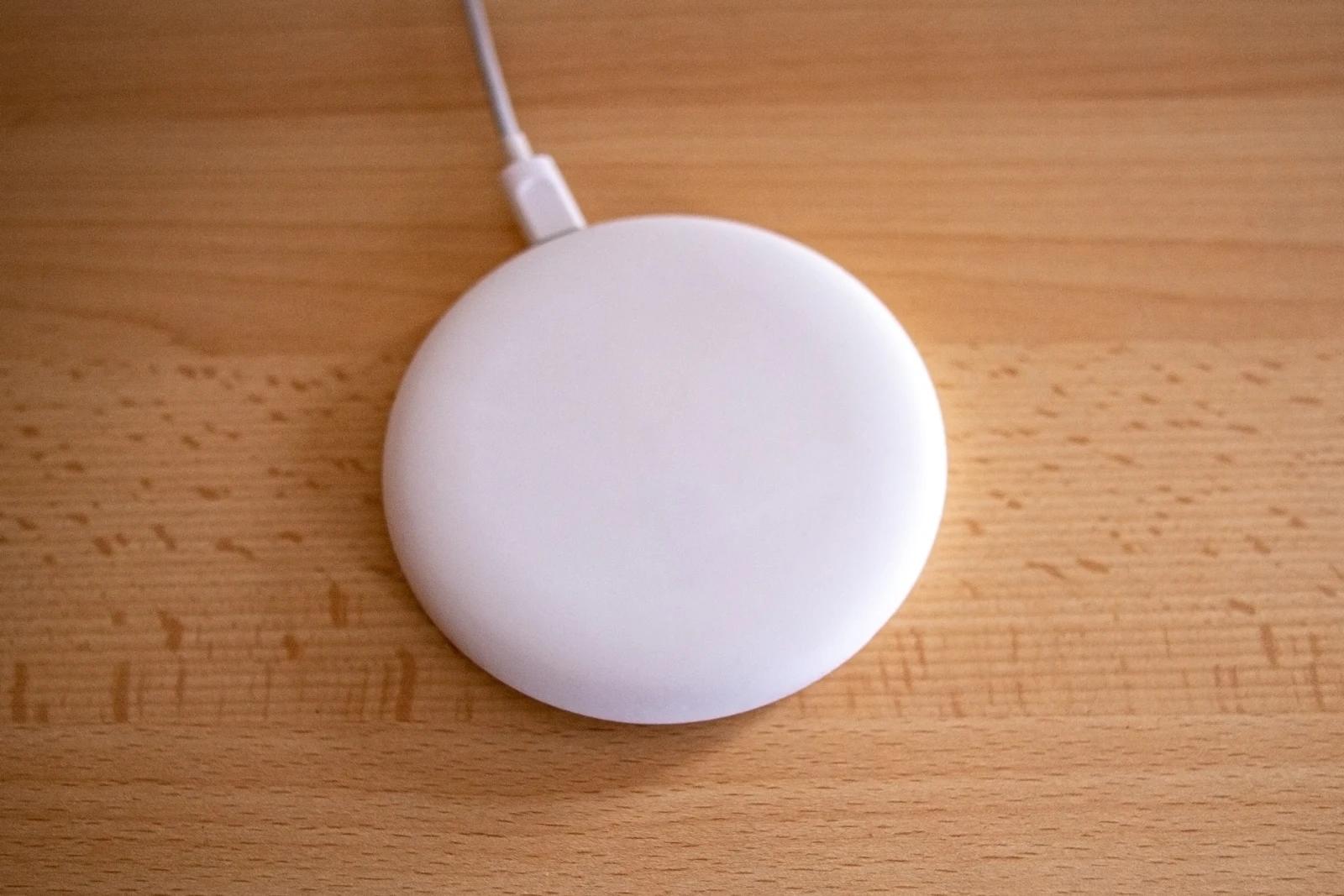 The round white MagSafe charger seen from above